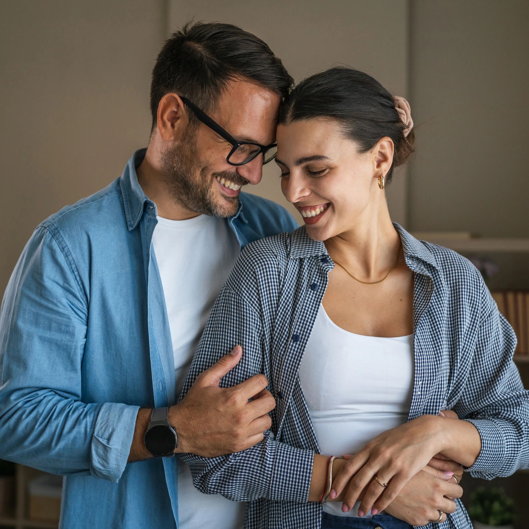 Happy couple at home