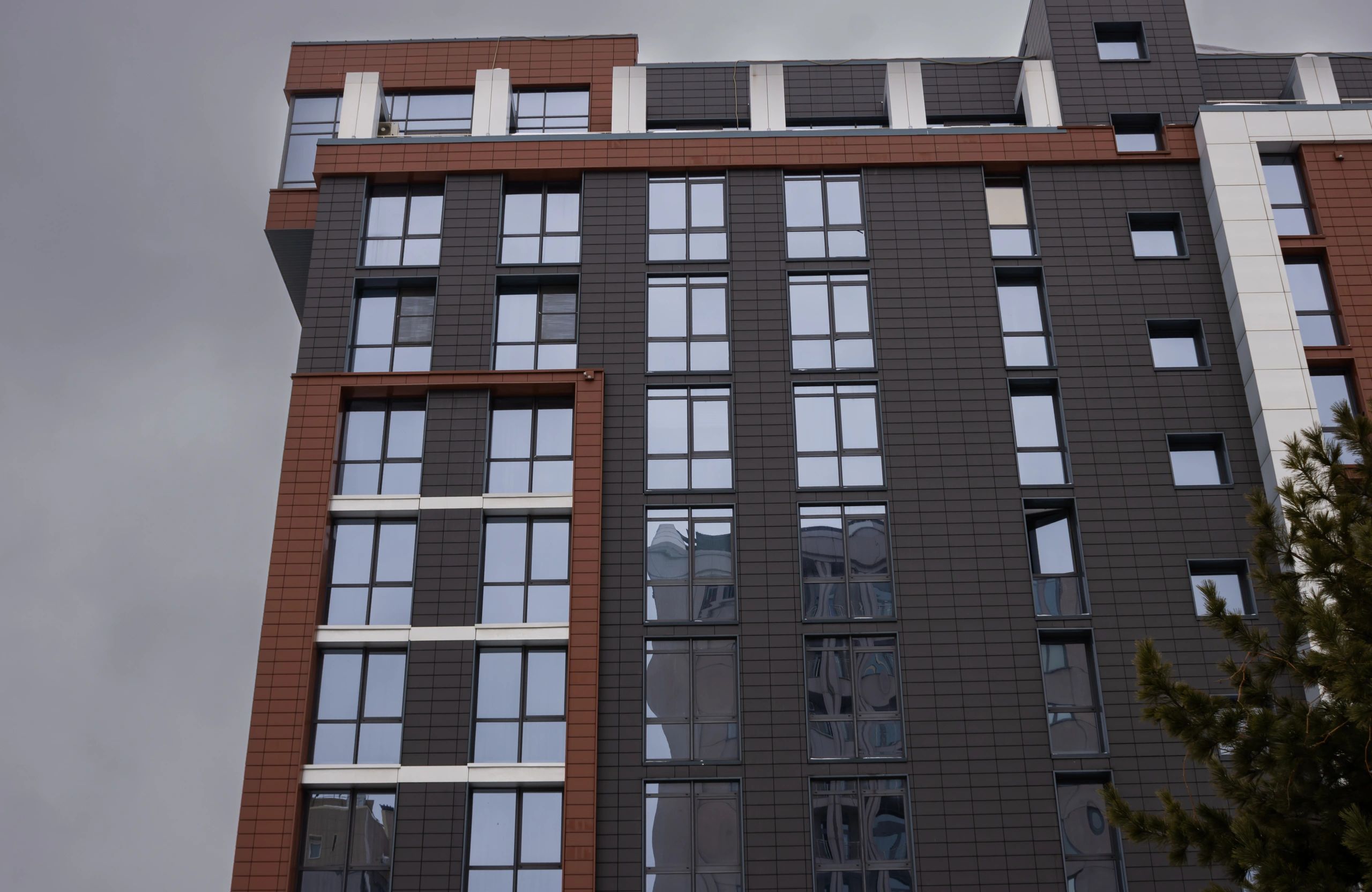 Modern high-rise building exterior representing property searches and data handling